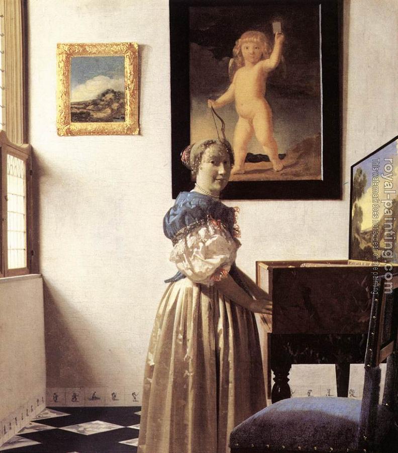 Johannes Vermeer : A Lady Standing at a Virginal